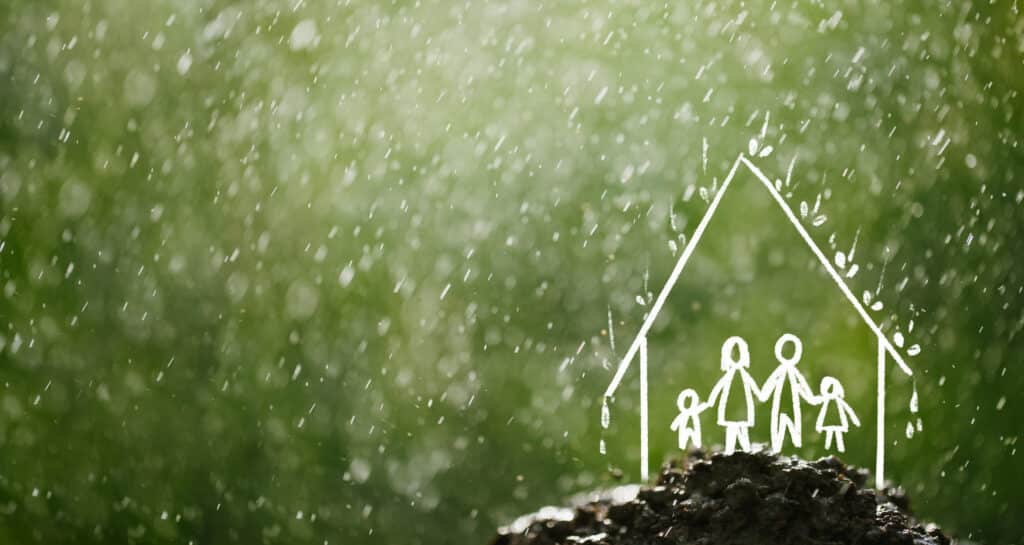 совети
Family in the house in the rain Insurance concept, future planning and home repairs concept